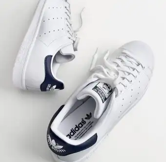 navy blue and white stan smith