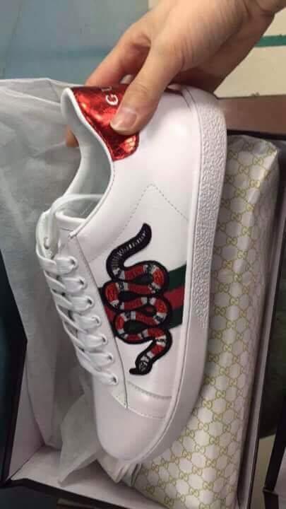 gucci ace snake on feet