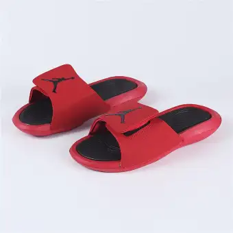 pink and black jordan sandals