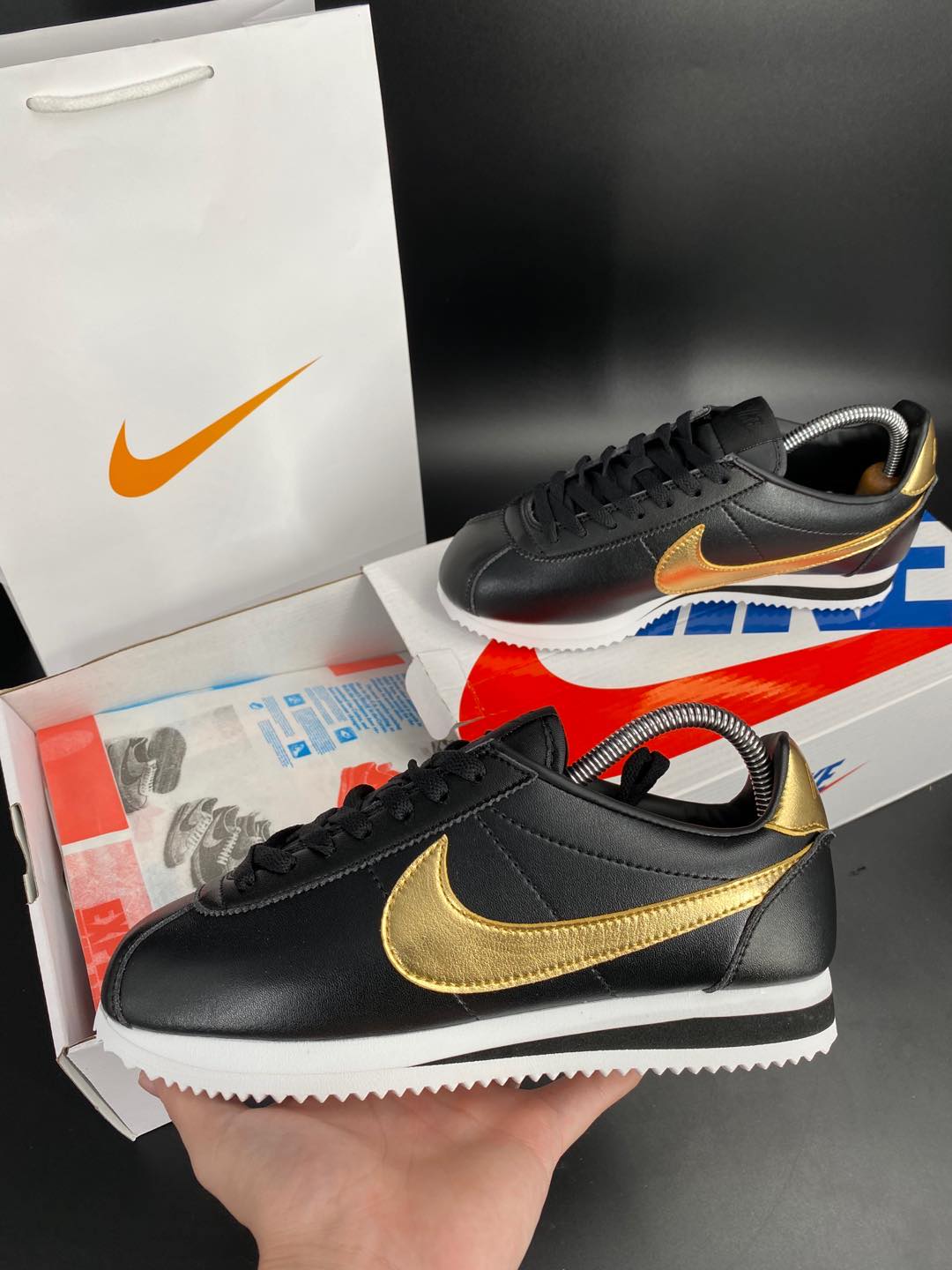 black and gold gym shoes