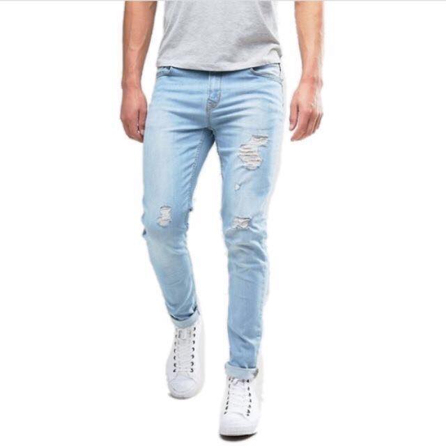 light blue denim ripped jeans