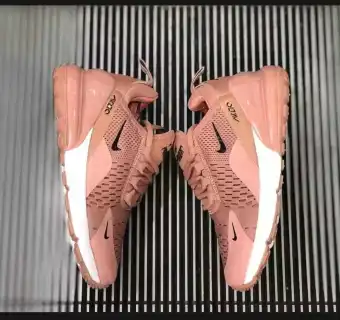 salmon colored nike shoes