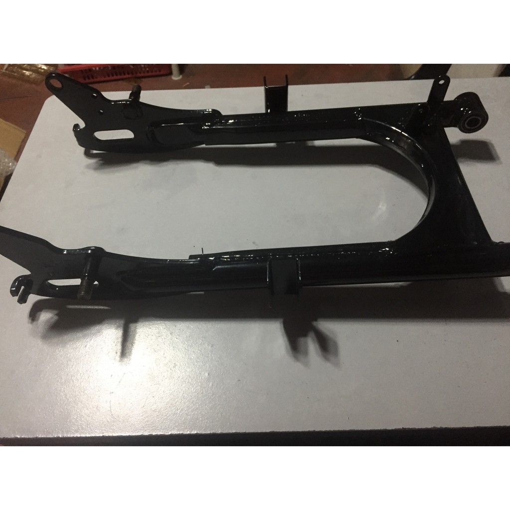 tmx 125 swing arm