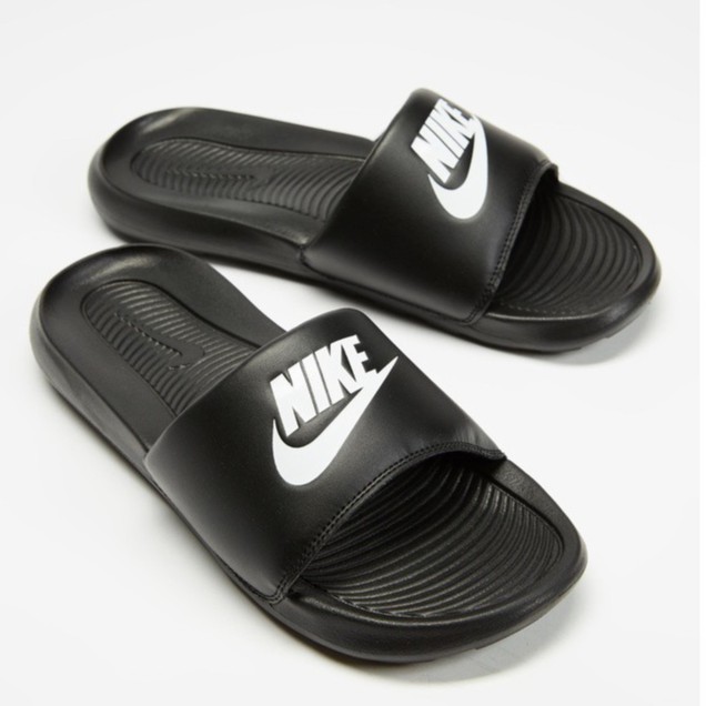 mens black and white nike slides