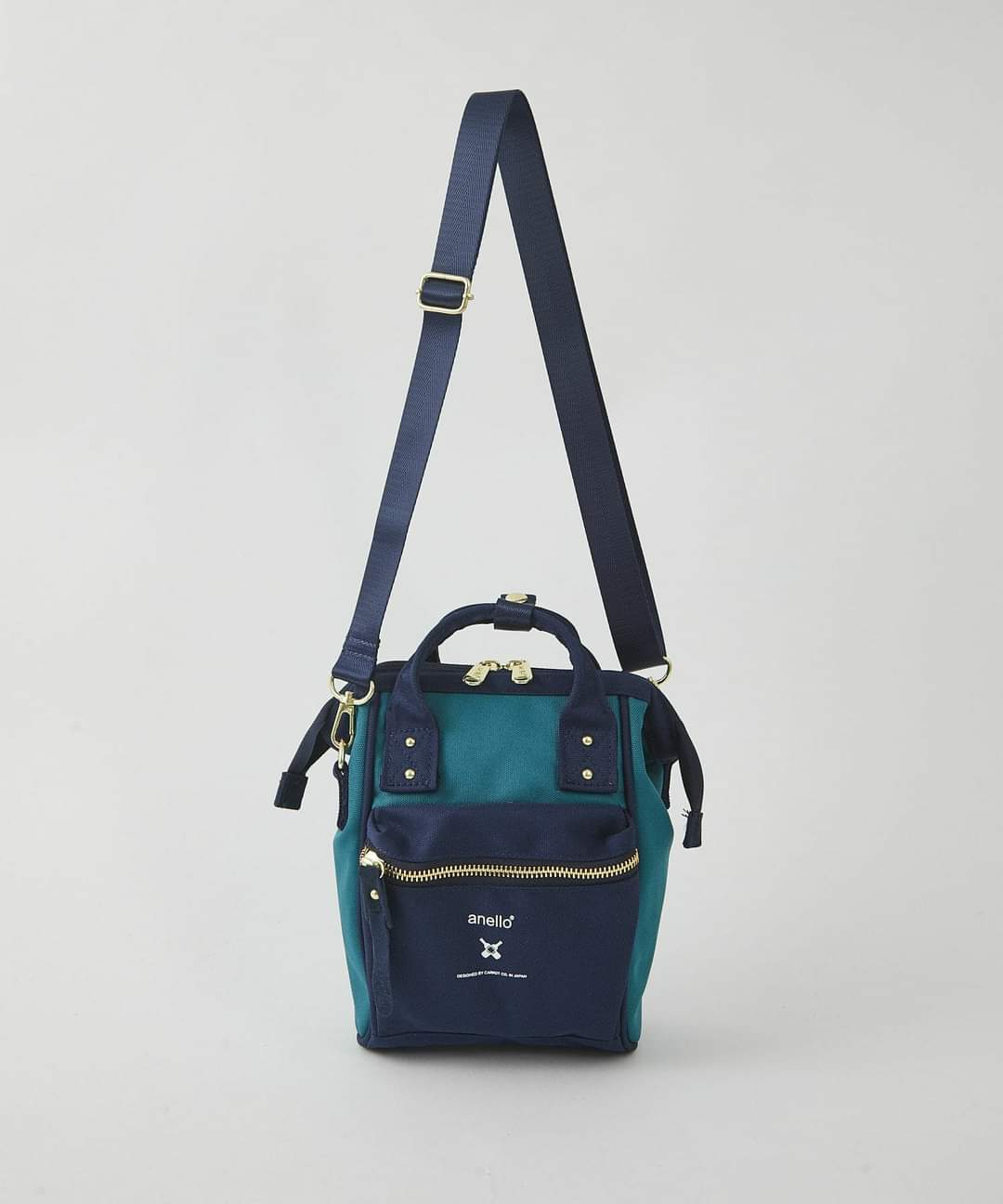 Shops anello canvas sling bag