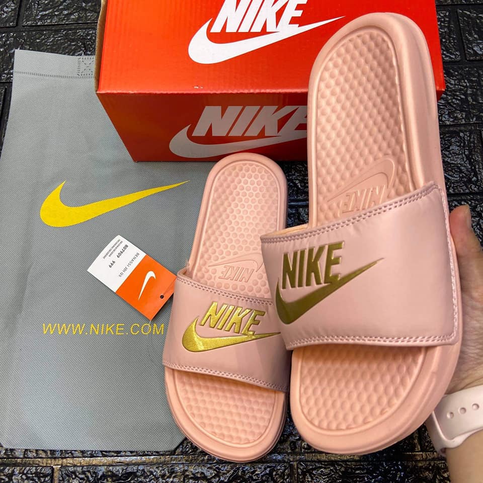 peach nike slides