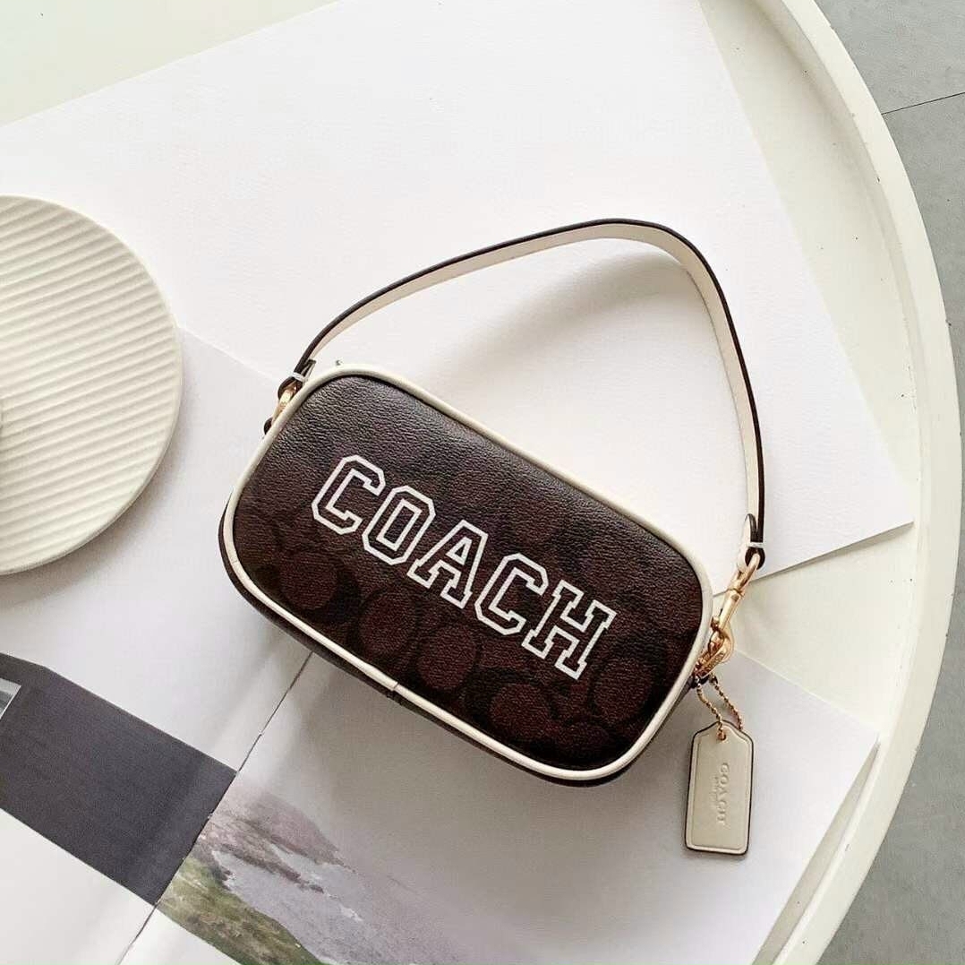 Coach Jamie Wristlet In Signature Canvas With Varsity Motif CB851