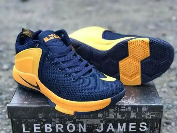 navy and yellow basketball shoes