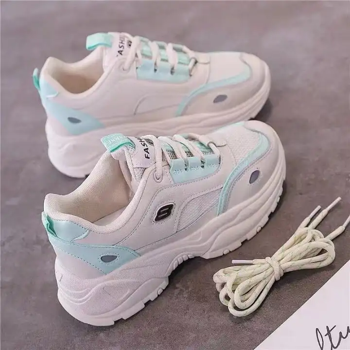 white sports shoes for women