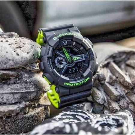 black and green g shock watch