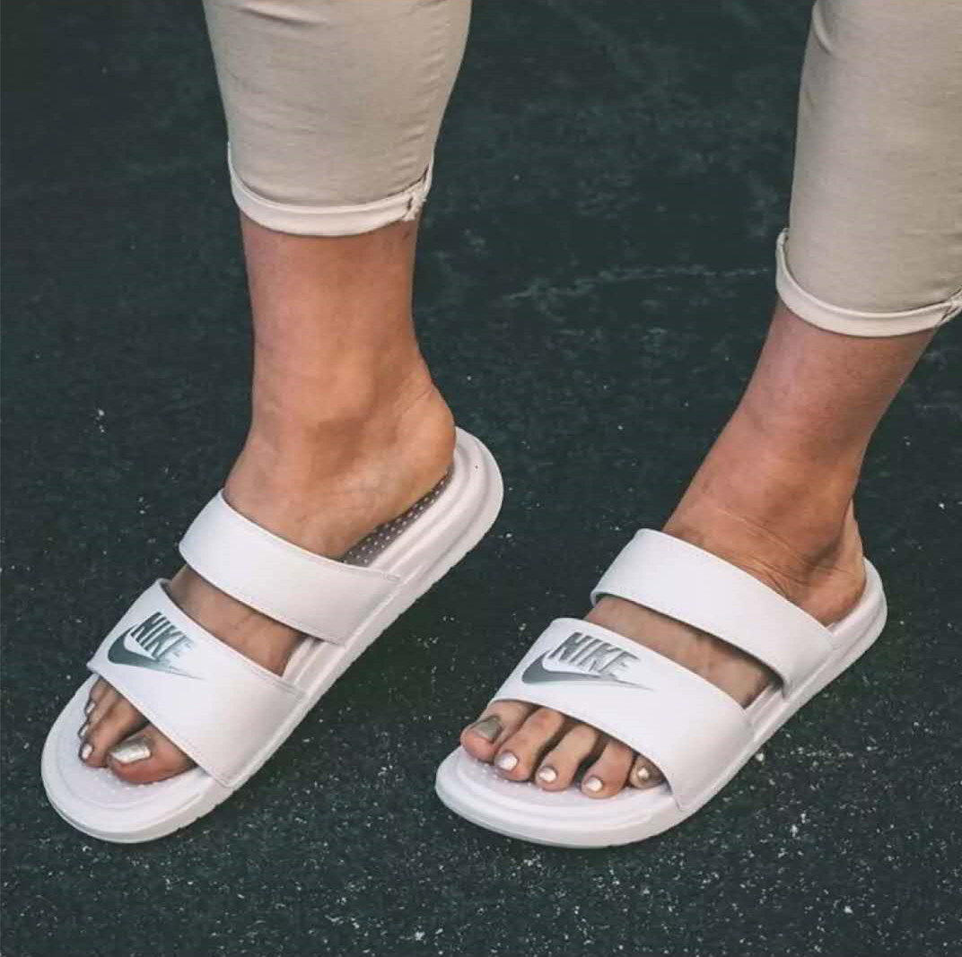 white two strap nike sandals
