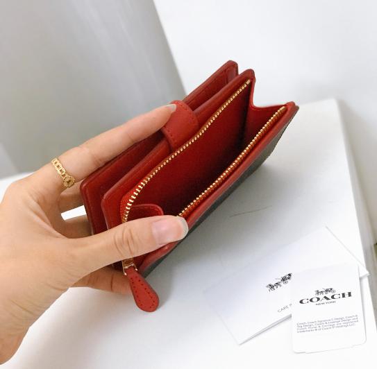 Shop Coach Medium Corner Zip Wallet In Signature Canvas (F23553) by  ペガサスペガサス☆