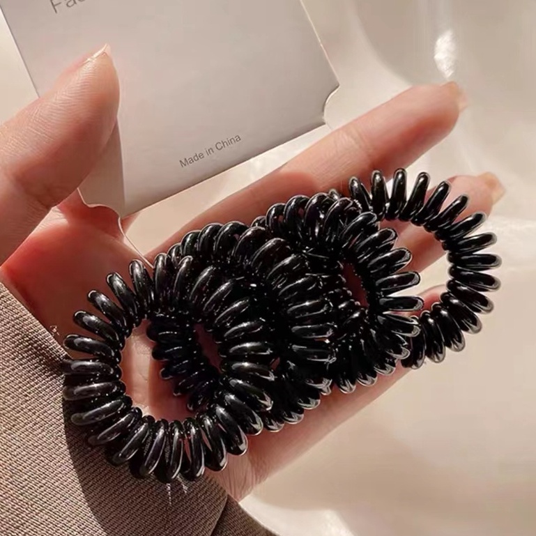 Telephone cord hair sales tie wholesale