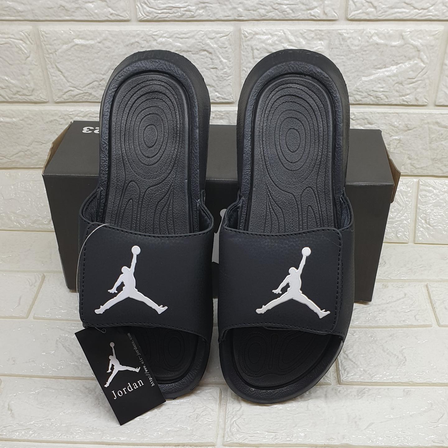 black and white jordan sandals