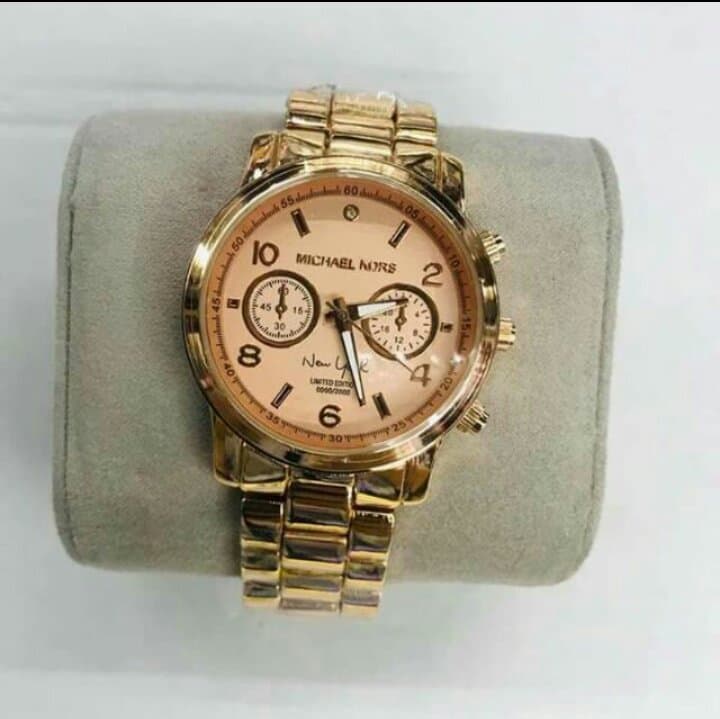 mk silver and rose gold watch