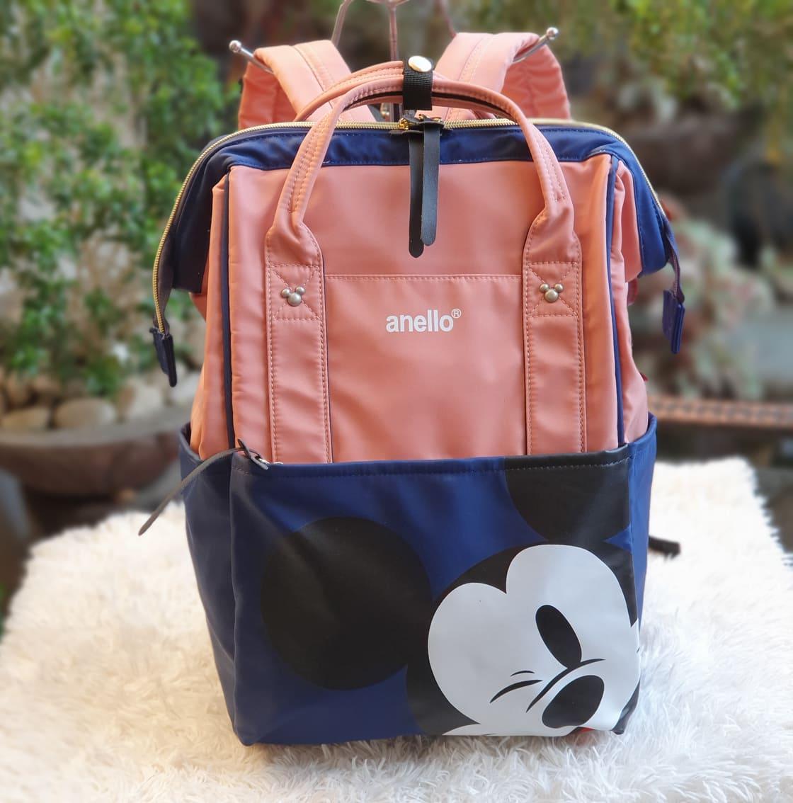 pink navy blue backpack