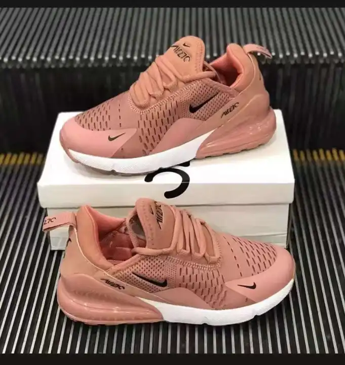 salmon colored nike shoes