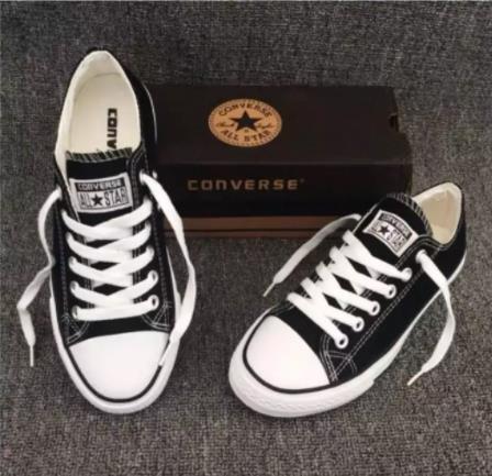 black and white low cut converse