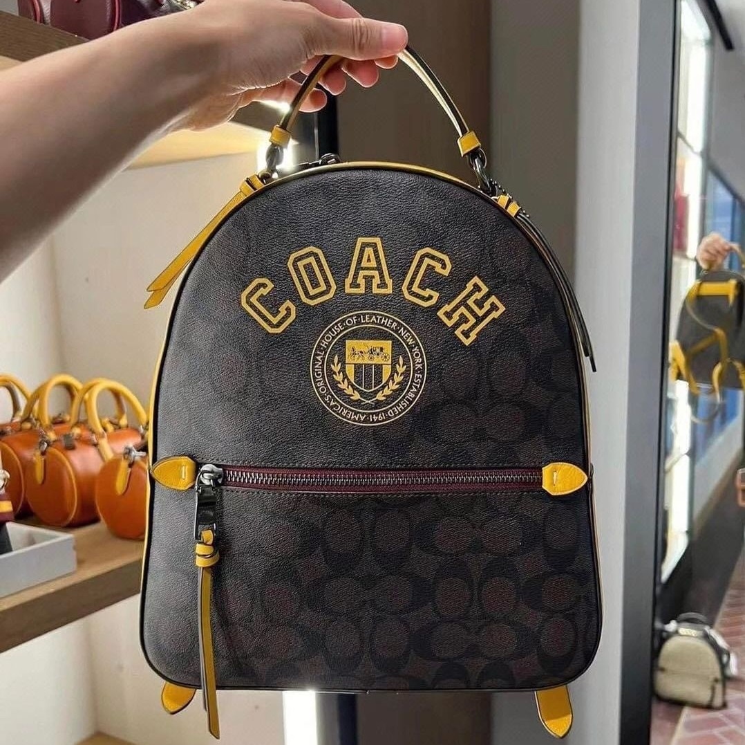 Authentic Coach CB871 Jordyn Backpack In Signature Canvas With Varsity