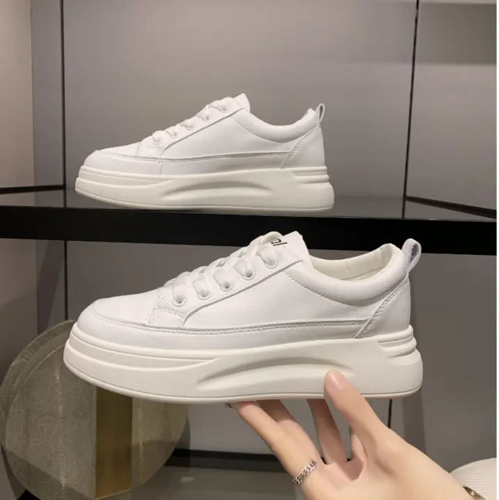 white sports shoes for women