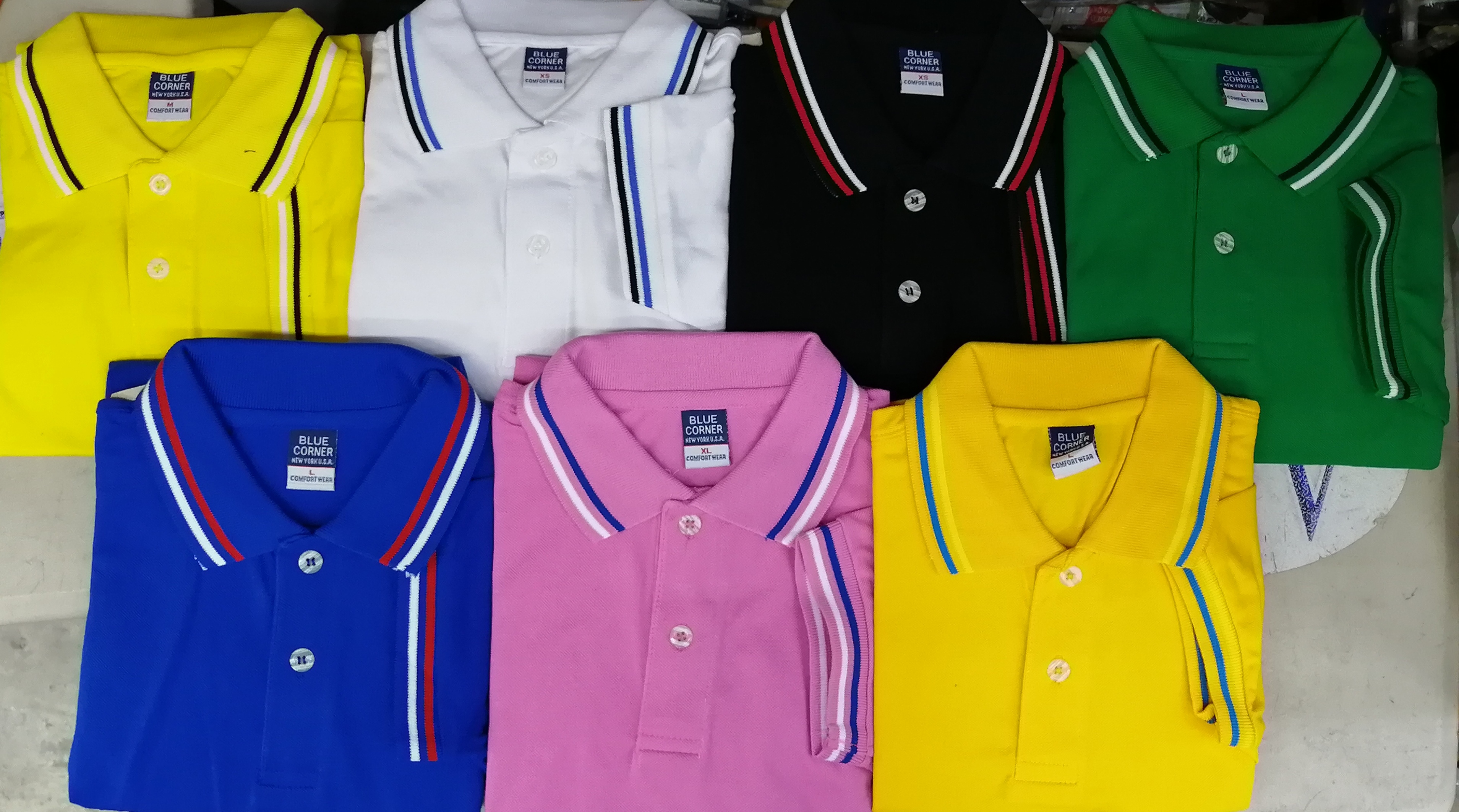 Blue corner polo 2025 shirt with stripes