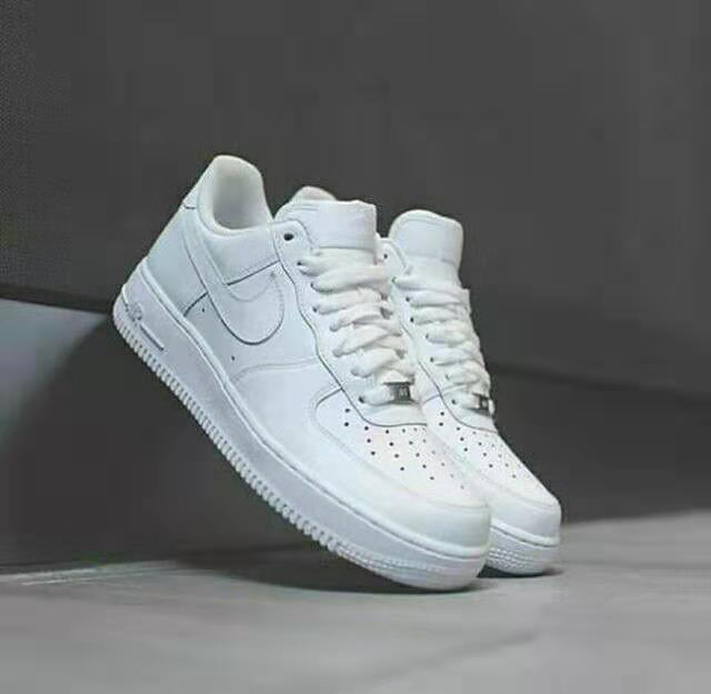 all white low top forces