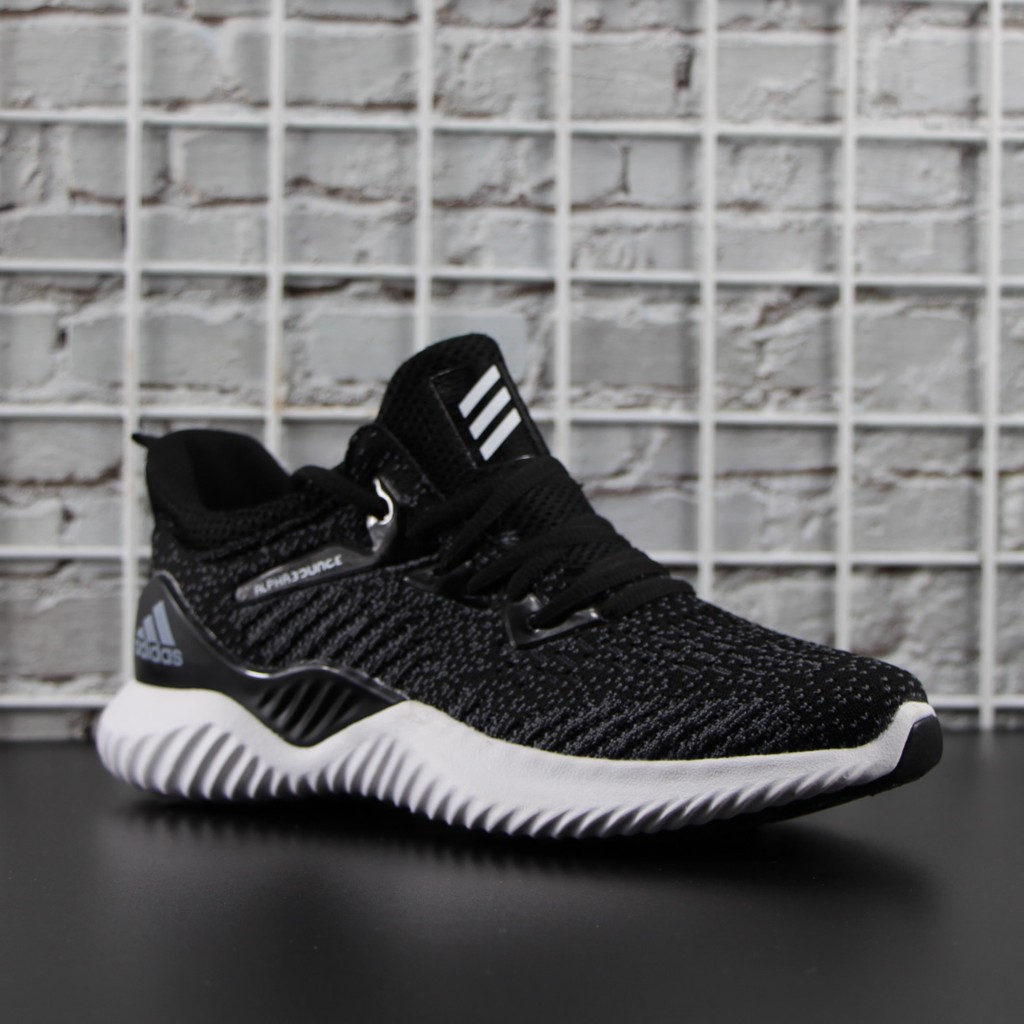 black white running shoes
