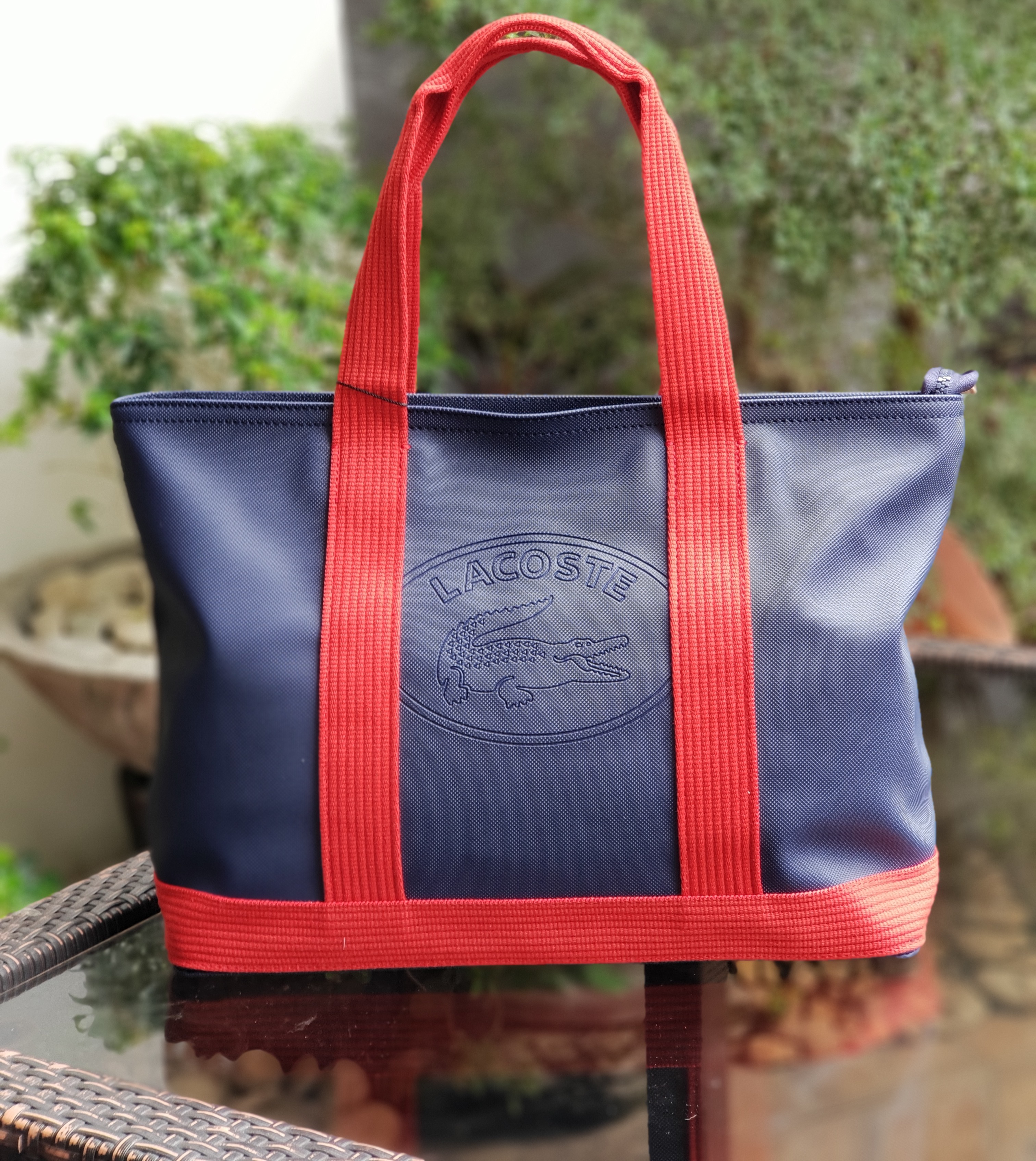 navy blue lacoste bag