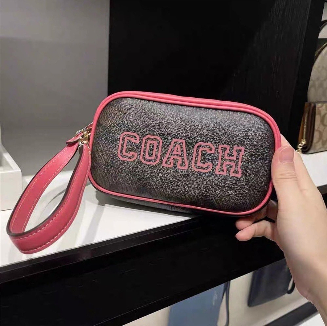 Coach CB851 Jamie Wristlet In Signature Canvas With Varsity Motif