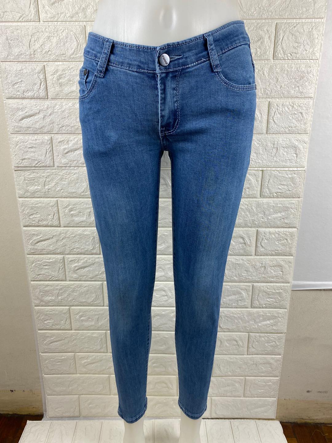washed blue skinny jeans