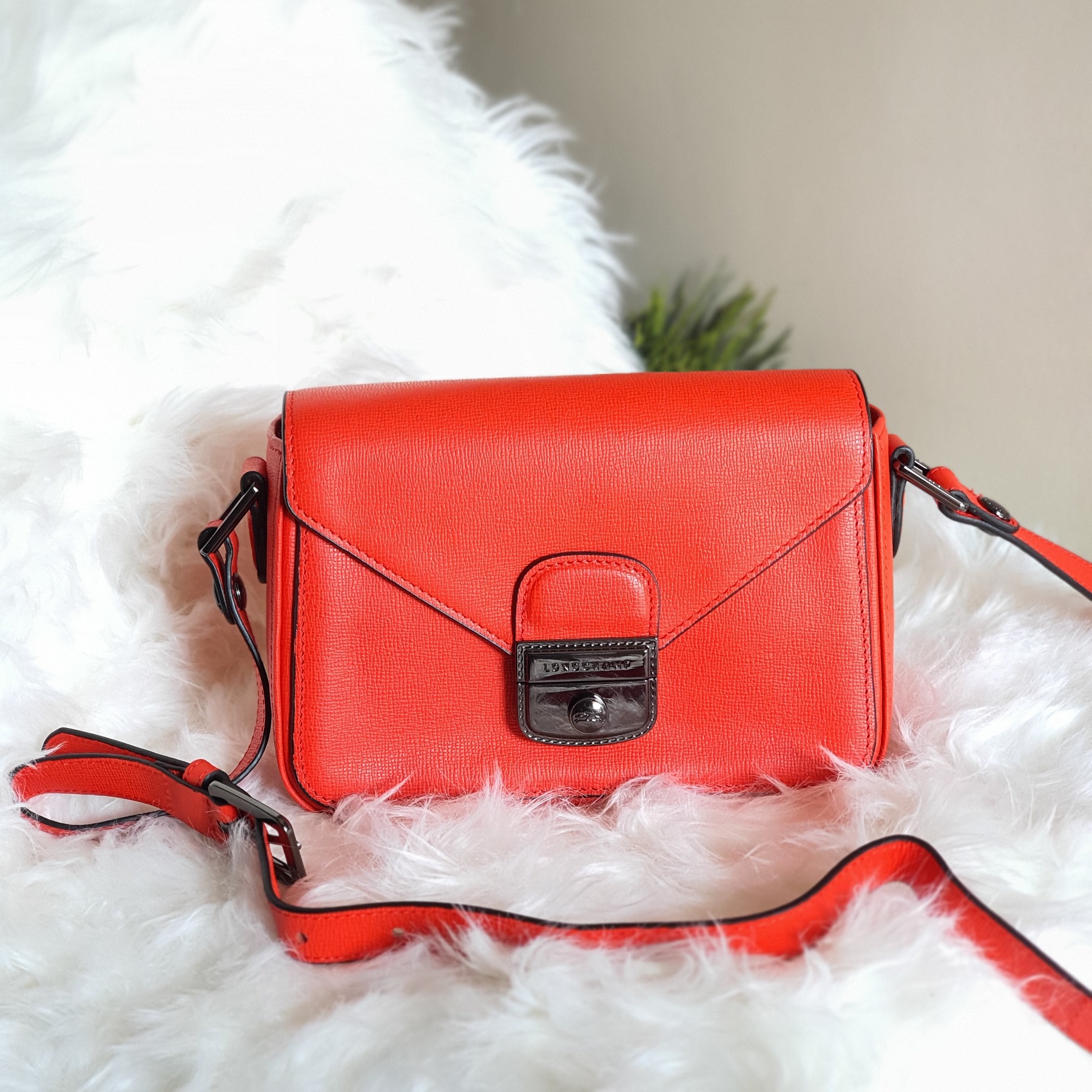 red leather handbag