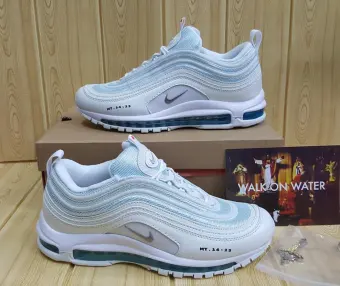 white and light blue nike air max