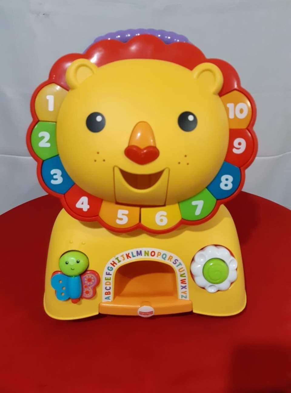 stride and ride lion fisher price