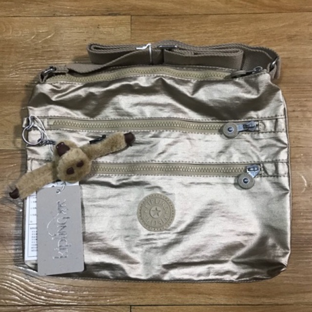 Kipling Metallic Tan Sling bag Lazada PH
