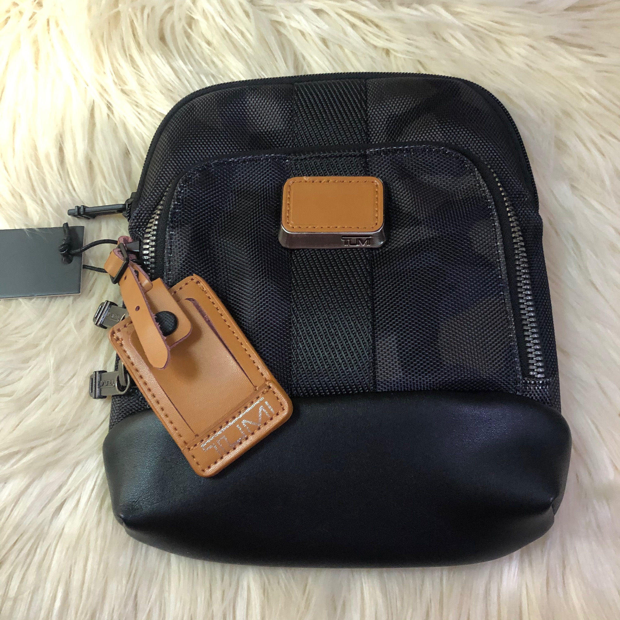 tumi shoulder bag price