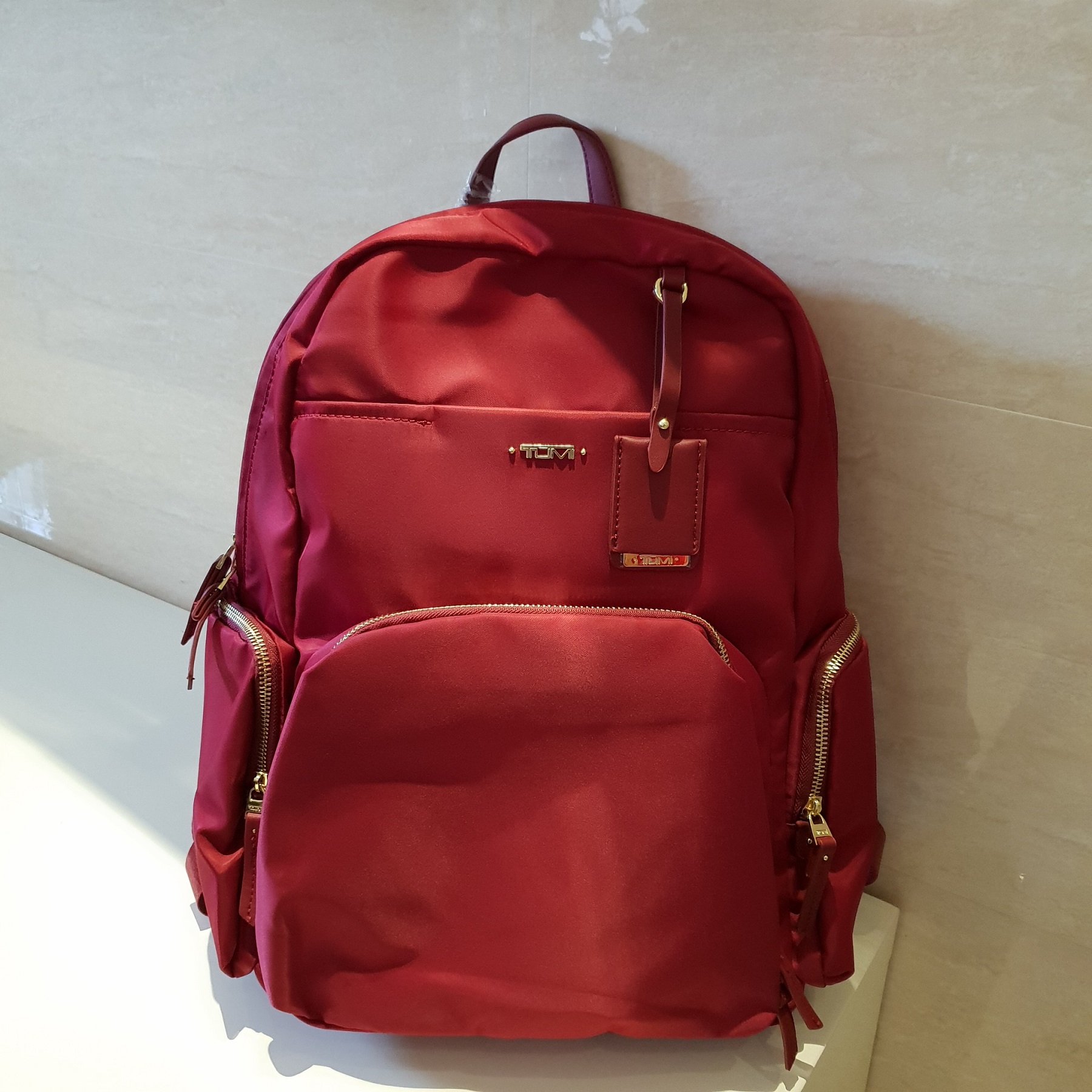 tumi calais leather trimmed nylon backpack