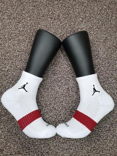 pink and white jordan flights