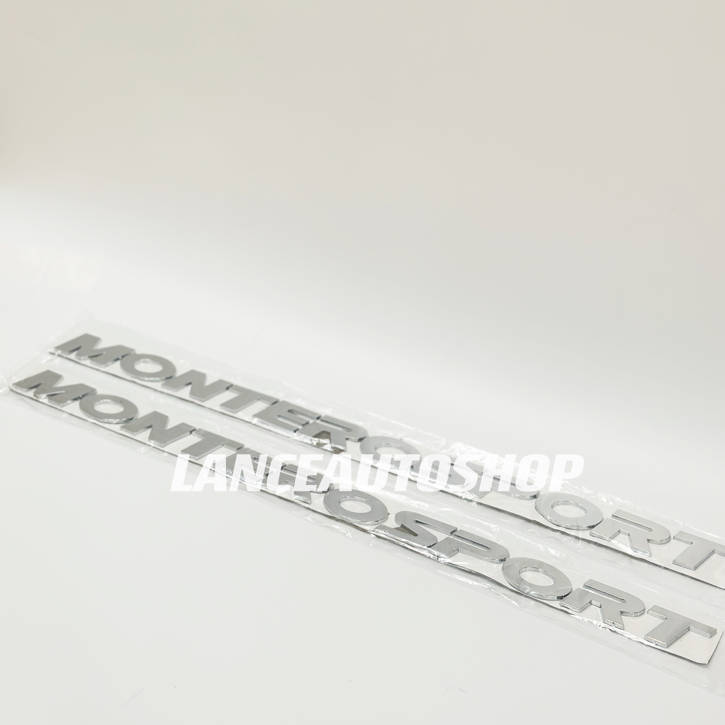 MONTERO SPORT Hood Emblem Matte Black Montero Sport Hood Emblem Silver