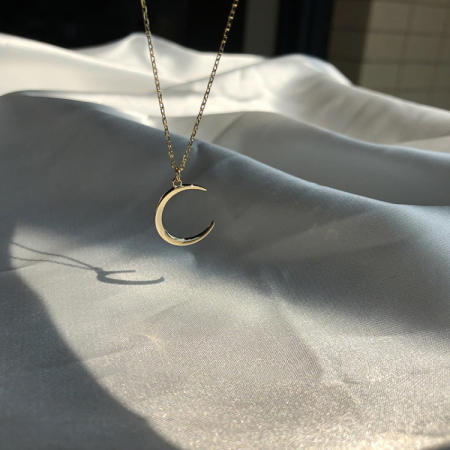 Tala by Kyla New Moon Necklace: Chic Simplicity with Style