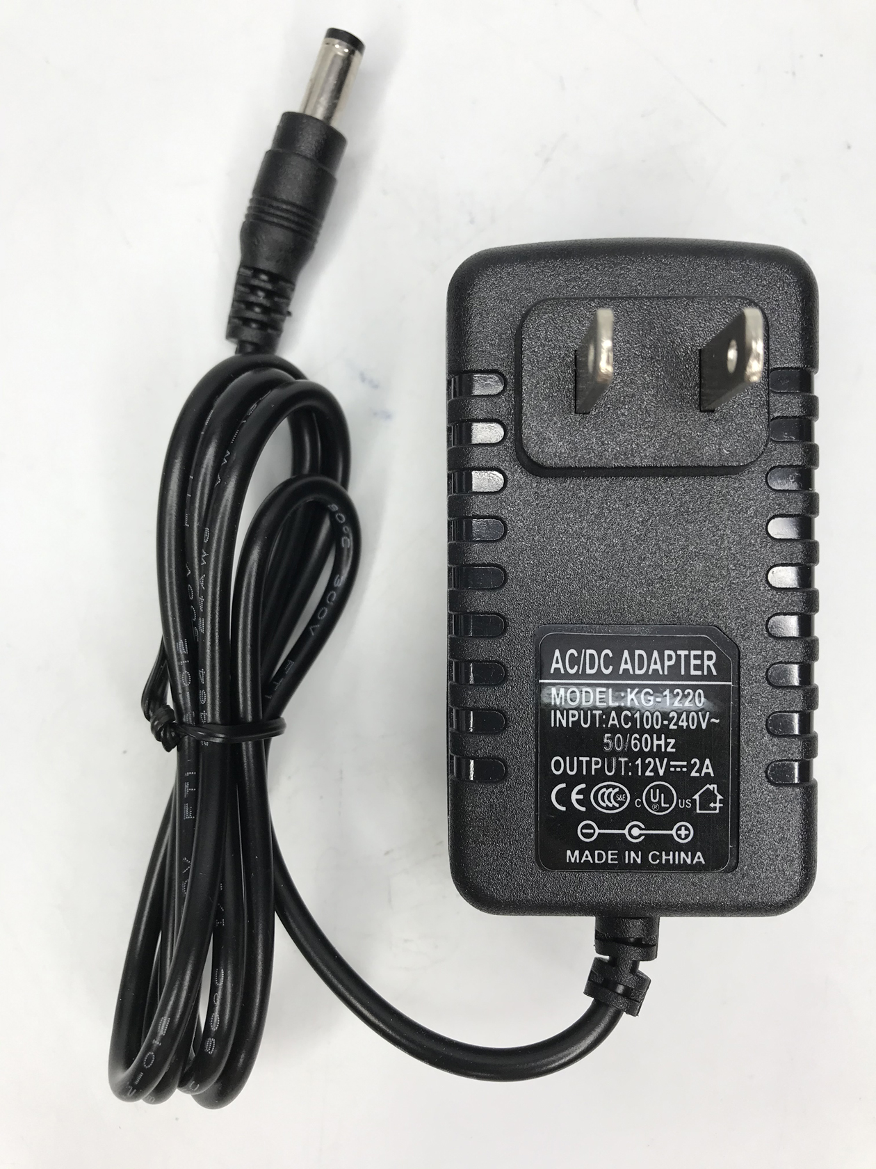 Adapter Charger Power Supply KG-1220, AC/DC input 100-240v, output 12V 2A,  50-60hz, Flat Tip