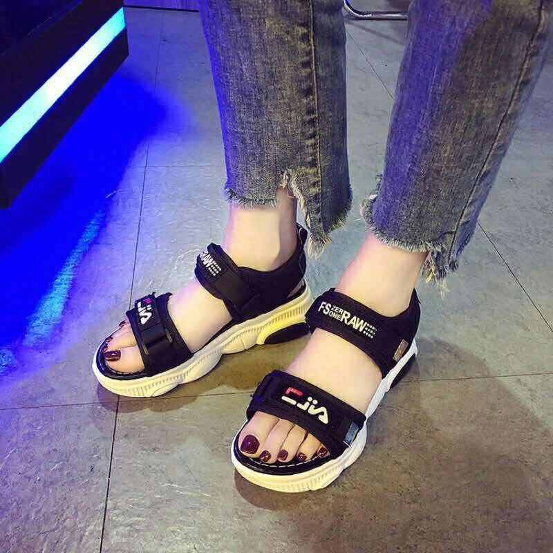 fila sandals on feet