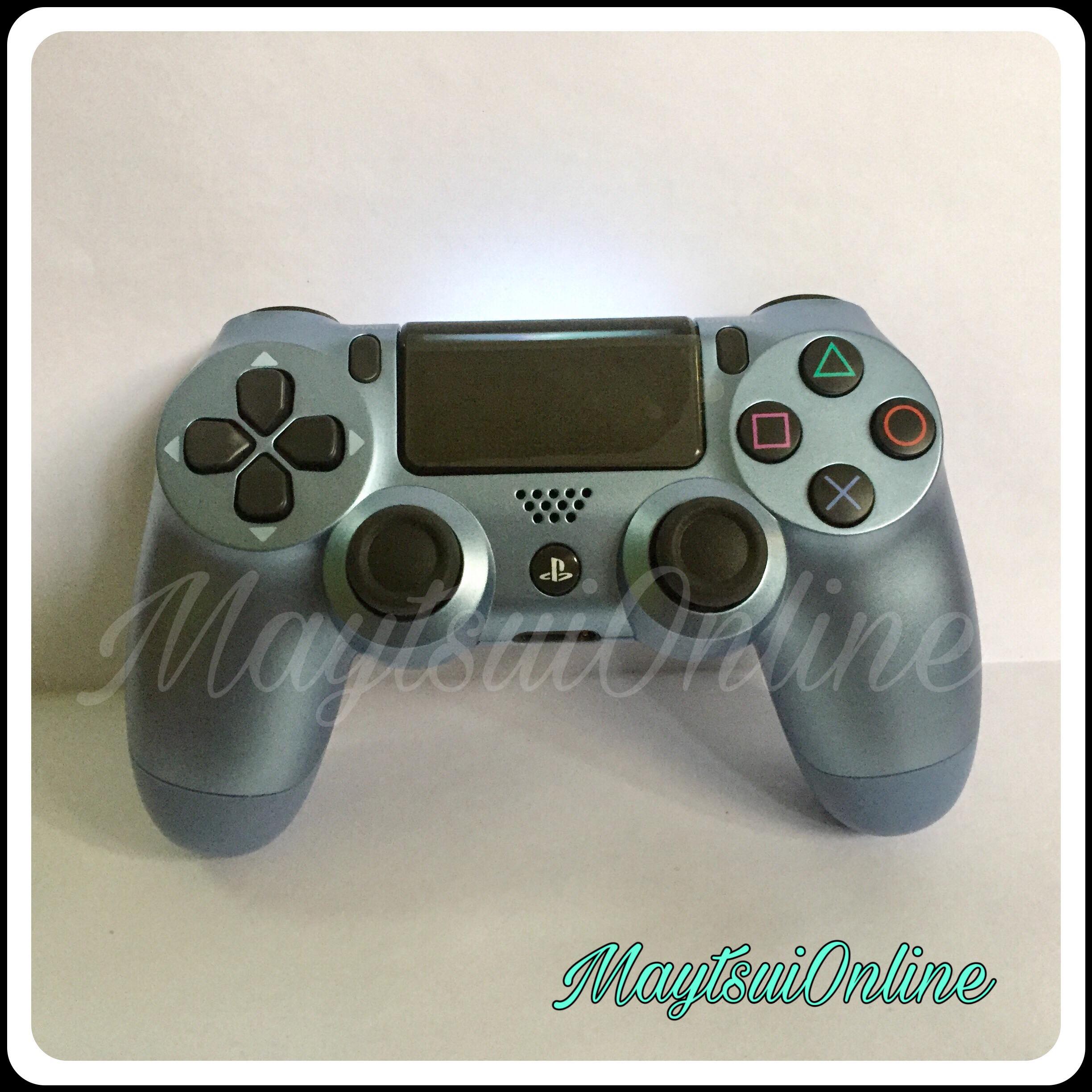 silver and blue ps4 controller