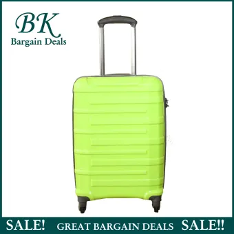 green hard case luggage