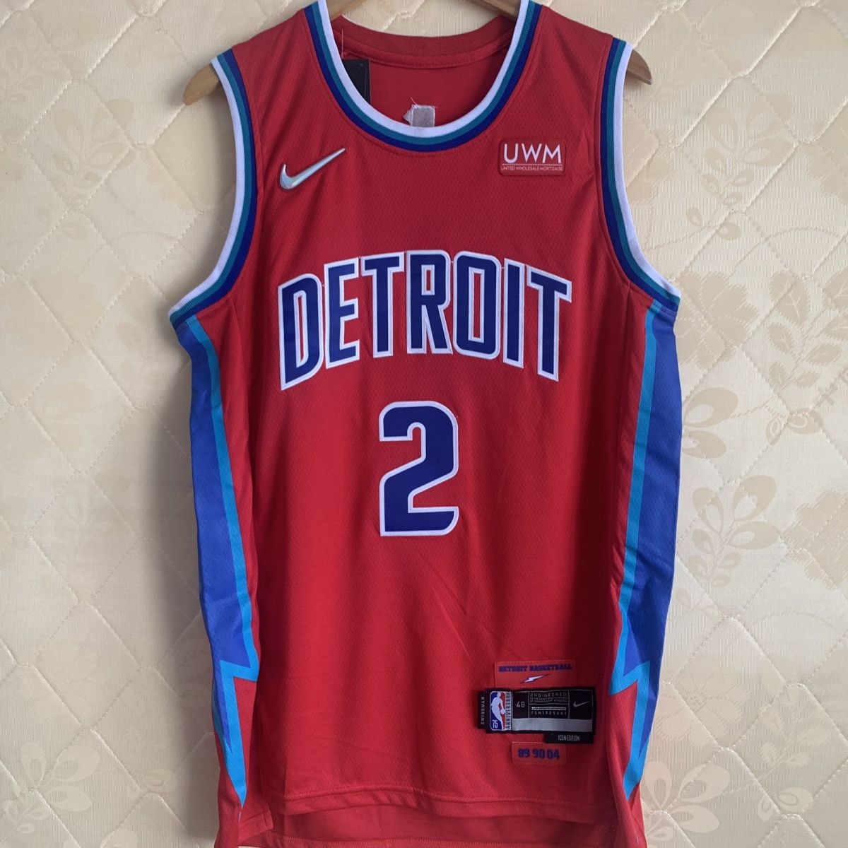 The 75th anniversary of the pistons jersey 33 Thomas hill 11 Cunningham