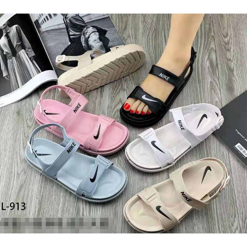 nike slippers for women price