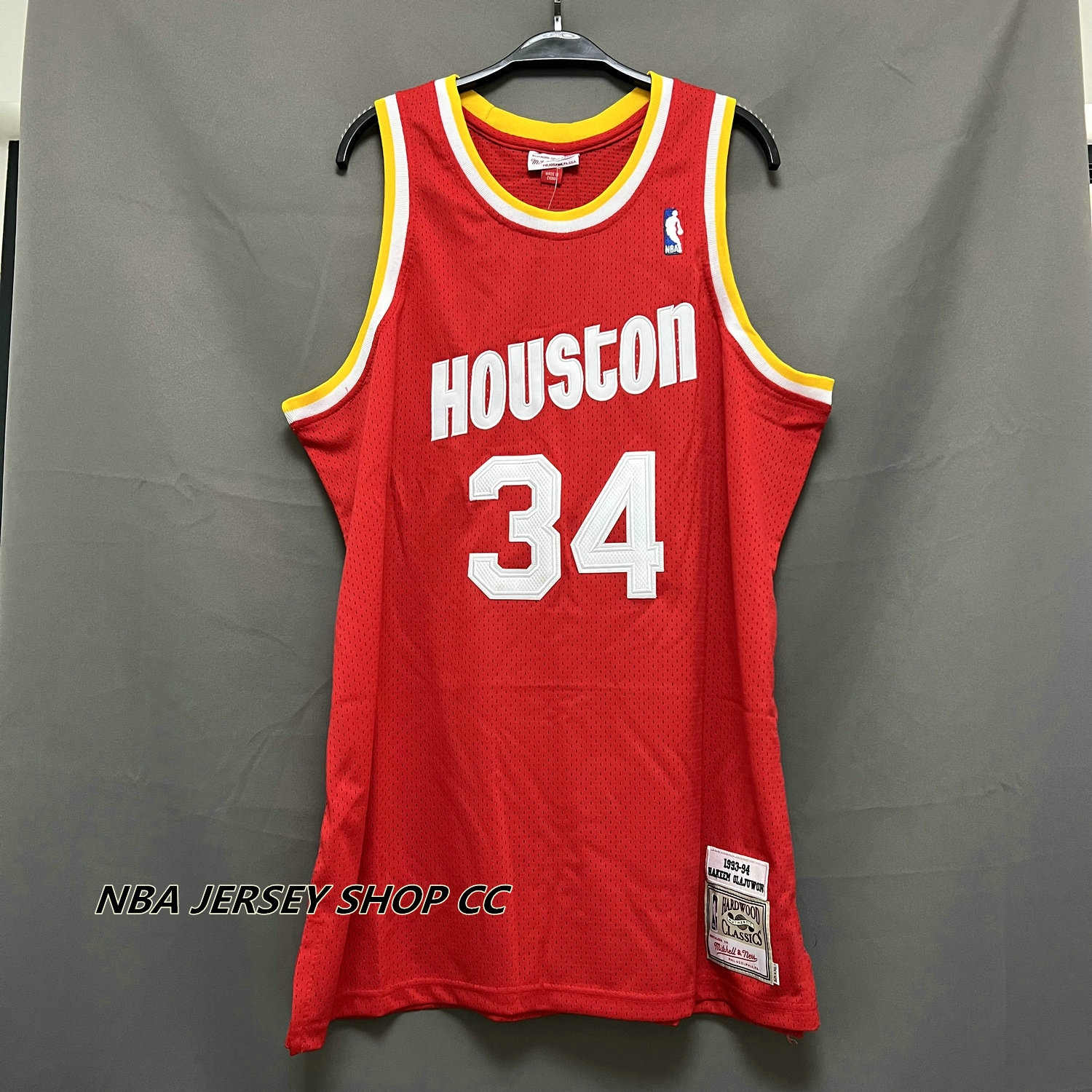 Infant Mitchell & Ness Hakeem Olajuwon Red Houston Rockets 1993/94 Hardwood  Classics Retired Player Jersey