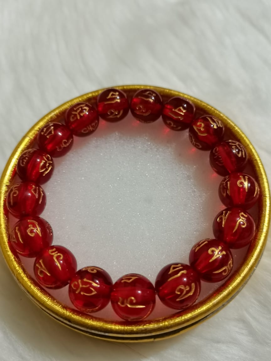 Red mantra bracelet on sale meaning