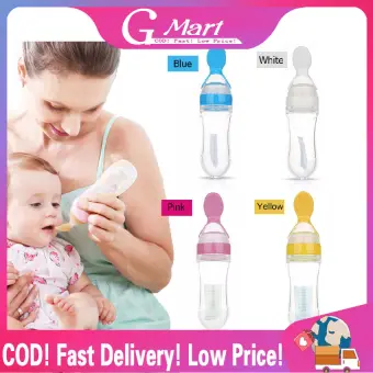 feeding baby cereal in bottle