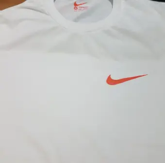 white nike shirt with red check