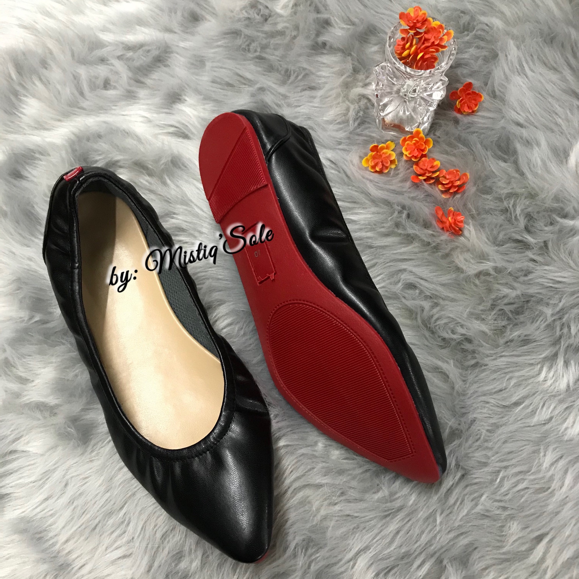 red sole flats